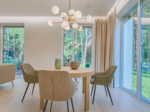 Bright dining room with large windows